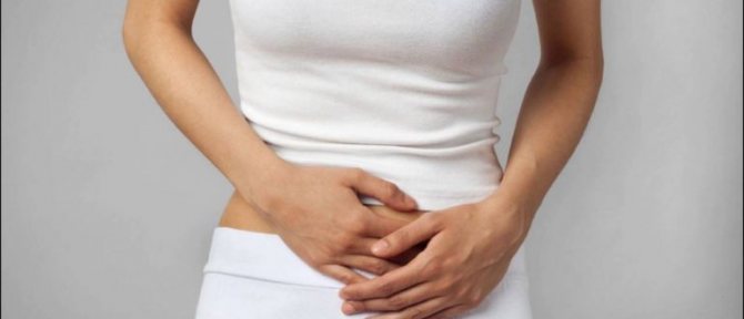 вздутие живота у девушки фото